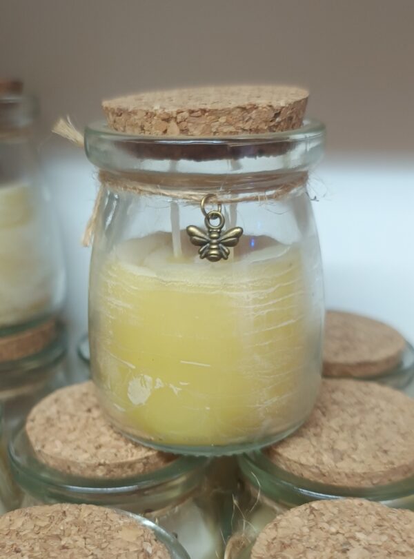 Vela de miel en vaso